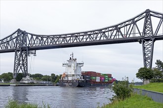 Container ship, cargo ship, high bridge, transporter bridge, Kiel Canal, Rendsburg,