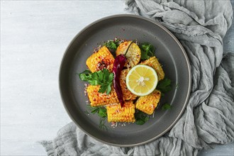 Grilled corn with spices, top view, no people, homemade