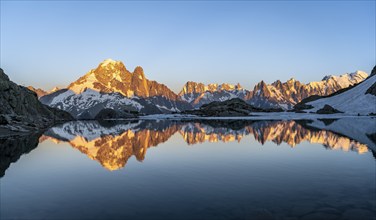 Evening mood, mountain landscape at sunset, alpenglow, water reflection in Lac Blanc, mountain