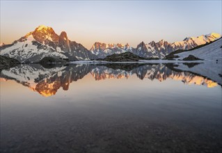 Evening mood, mountain landscape at sunset, alpenglow, water reflection in Lac Blanc, mountain