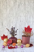 Advent, Still life with autumn leaves and tree baubles, Germany, Europe