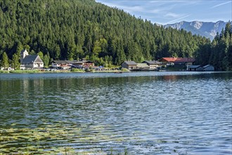 Mountain lake and village Spitzingsee, municipality Schliersee, behind mountains Krenspitze and