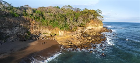 Aerial view, rainforest, sandy beach and coast with waves, Playa Cocalito, Puntarenas, Costa Rica,