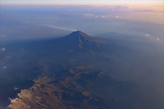 A scenic aerial view of Mexican mountains range located in the states of Puebla, Morelos and