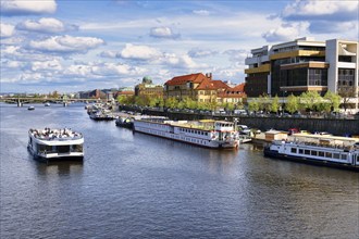 Tourist boat navigating on the Vitava River, Prague, Bohemia, Czech Republic, Europe