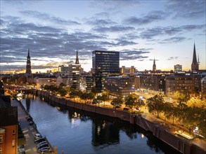 Aerial view of Hamburg's Speicherstadt warehouse district on the Zollkanal during the blue hour,