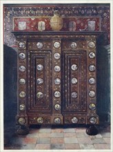 Furniture around the turn of the century 1900, Walnut cabinet with inlays and painted medallions of