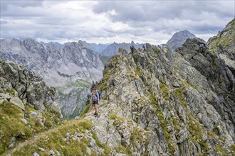 Hiker on the Carnic High Trail, ascent to the Raudenspitze, Carnic Main Ridge, Carnic Alps,