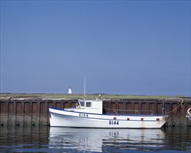 Moored fishing boat in Le Goulet harbour, New Brunswick, Canada, North America