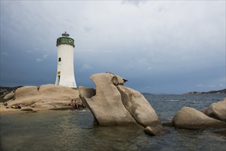 Lighthouse with beach and bizarre granite rocks, Spiaggia Porto Faro, Faro di Punta Palau, Palau,