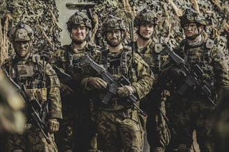 Armed soldiers, photographed as part of a Bundeswehr exercise with armed forces from Norway and the