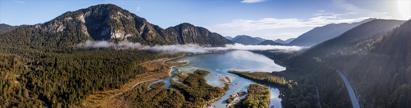 Aerial view of a mountain lake in autumn, morning light, backlight, panorama, Sylvensteinsee,