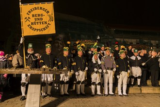 Miners pay their respects on the castle square Traditional mining and smelting parade in Freiberg.