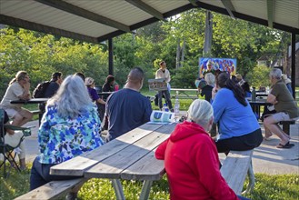 Detroit, Michigan, Members of the Morningside Community Organizing hold their monthly meeting in a