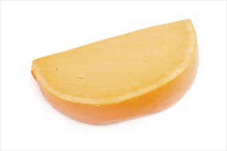 Piece of orange cheese isolated on white background. Top view, close up