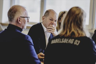 Olaf Scholz (SPD), Federal Chancellor, at a meeting with migrants and people involved in the field