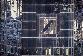 Deutsche Bank logo on one of the two 155 metre high twin towers in the banking district, corporate