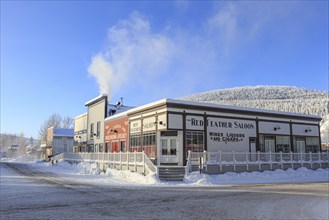 Historic building, pub, saloon, snow, winter, cold, sunny, Dawson City, Yukon, Canada, North