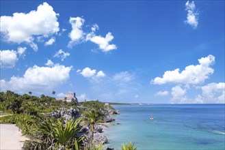 Mexico, Tulum Archaeological Zone and Mayan pyramids on scenic ocean shore, Central America