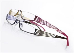 Two stylish glasses from JOOP on a white background, studio shot