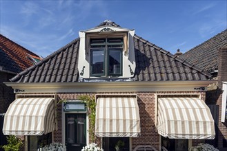 Typical Dutch house, awnings, sun protection, living, house, architecture, history, tourism, lambs,