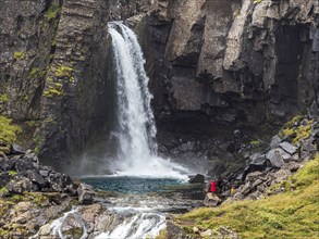 Waterfall Folaldafoss, at Öxi Mountain Road 939, tourists, East Fjords, Iceland, Europe