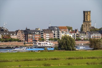 Skyline of Emmerich, on the Lower Rhine, left bank of the Rhine, cargo ship, St. Aldegundis Church,