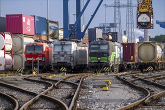 Locomotives of container trains, in Duisburg harbour, Logport, goods trains being loaded, part of