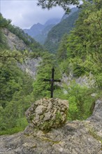 Cross on the way to the Pozze Smeraldine, Tramonti di Sopra, Province of Pordenone, Italy, Europe