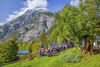 Restaurant terrace of the Landgasthof Ropferstubn above the Inn Valley in front of the Hohe Munde