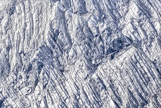 Rock bands or stratifications in the limestone of the Hochkalter Mountains, abstract background,