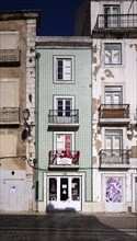 House, house facade, narrow, azulejos, tiles, tile decoration, historic centre, Lisbon, Portugal,