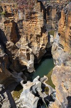 Canyon with steep orange-coloured cliffs with the Blyde River, Bourke's Luck Potholes, Panorama