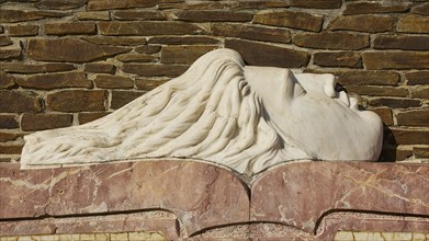 Relief of a reclining sculpture of a woman in stone carving on a stone wall, visit of Federal