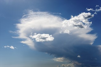 A blue sky with white clouds that stand out in the light of the sun, Spain, Europe