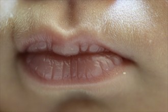 Close-up of baby lips with soft, delicate skin