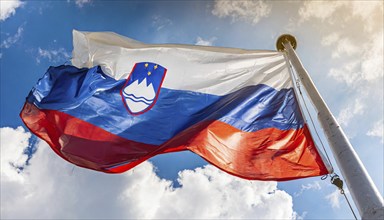 Flags, the national flag of Slovenia flutters in the wind