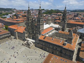 Aerial view of a large square in front of an impressive cathedral, surrounded by historic buildings