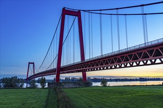 The Emmerich Rhine Bridge, federal road B220, evening light, at 803 m the longest suspension bridge