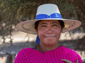 Indigenous woman of the Atacameño minority, with hat, Atacama Desert, Chile, South America