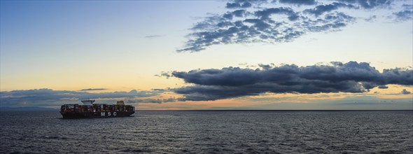 Maersk Line Container Ship on sea at sunrise, Barcelona, Spain, Europe