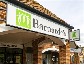 Barnardo's charity shop signs, Stowmarket, Suffolk, England, UK