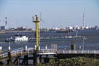 The port of Antwerp, on the Scheldt, is the second largest seaport in Europe, barges on the