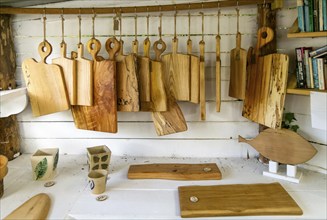 Wooden chopping boards in shop LandWorks prisoner training project, Dartington Hall estate, south