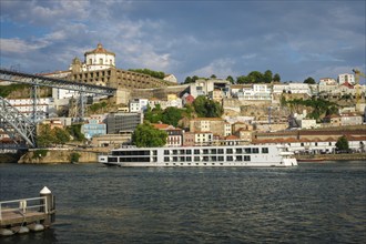 View of Vila Nova de Gaia city riverfront with Mosteiro da Serra do Pilar monastery and Dom Luis I