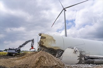 Demolished tower of a 20 year old wind turbine, in the Werl wind farm, 5 old Enercon E-66 turbines