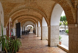 Archways in Piazza Umberto in Venosa. Venosa is an Italian municipality in the north of the