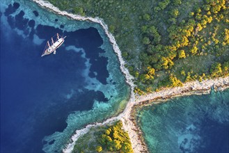 Bay with sailing boat, Pakleni or Paklinski Islands off the island of Hvar, Dalmatia, Croatia,