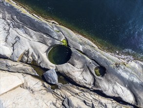 Glacial holes at the coast, near Sild, norwegian south coast, Norway, Europe