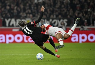 tackle, action, foul, Josha Vagnoman VfB Stuttgart (04) v Hugo Ekitike Eintracht Frankfurt SGE (11)